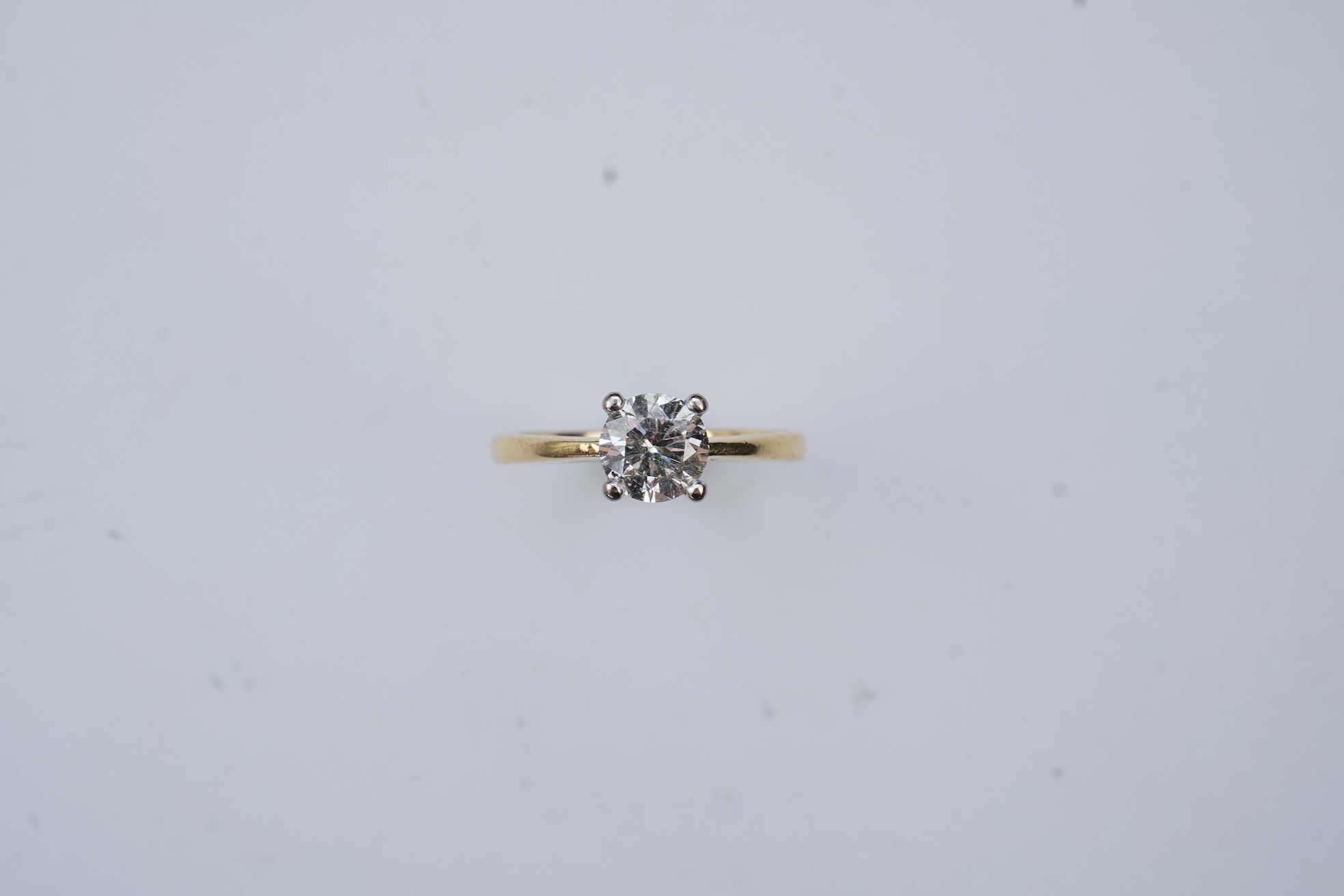 A diamond solitaire ring